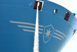 Maersk container ship bow with logo and mooring rope