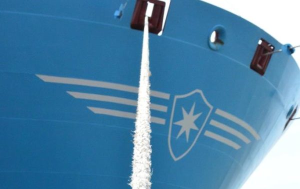 Maersk container ship bow with logo and mooring rope